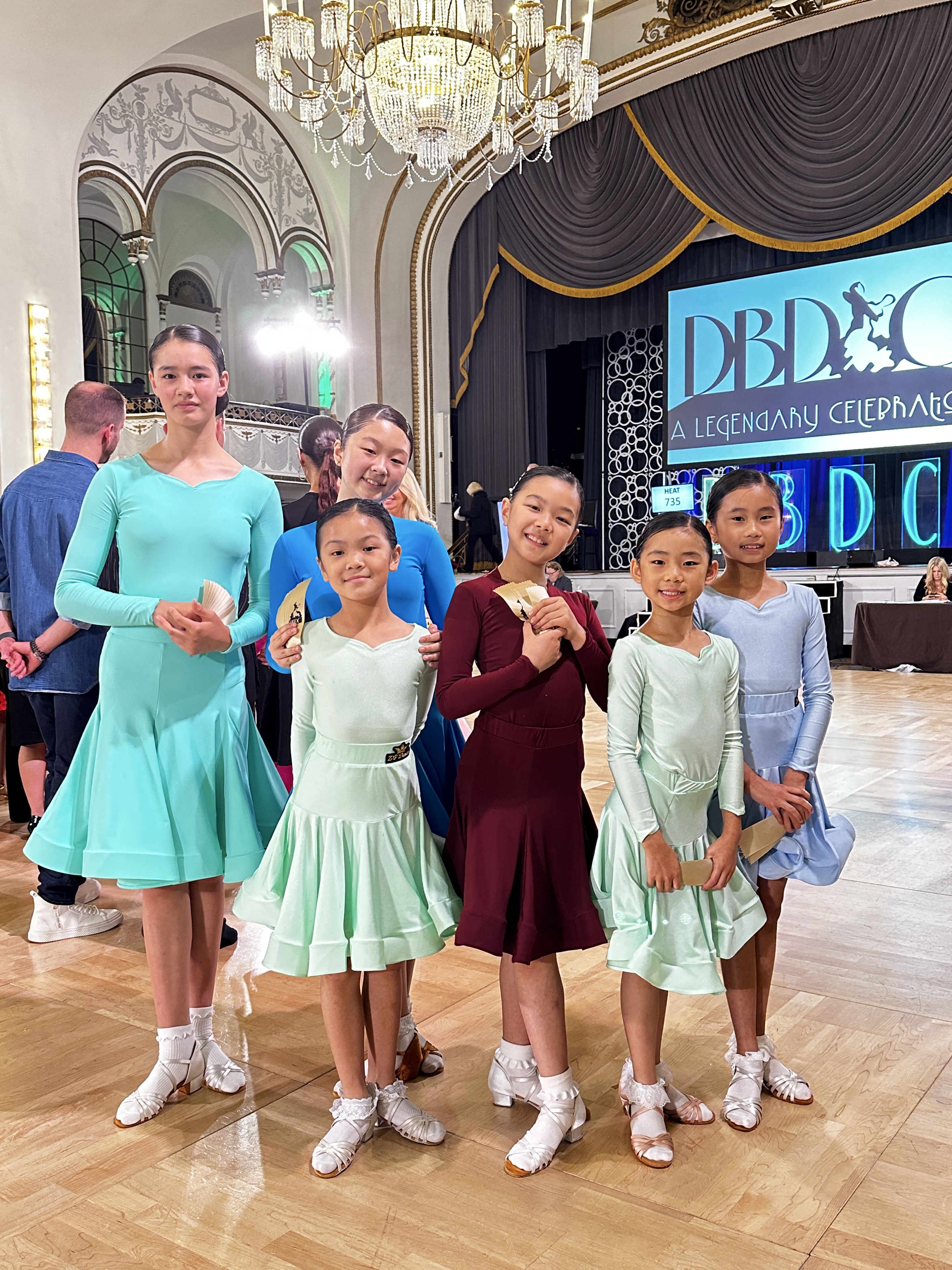 Youth ballroom competitors at a championship